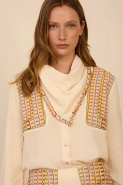 Blusa bimateria con pañuelo