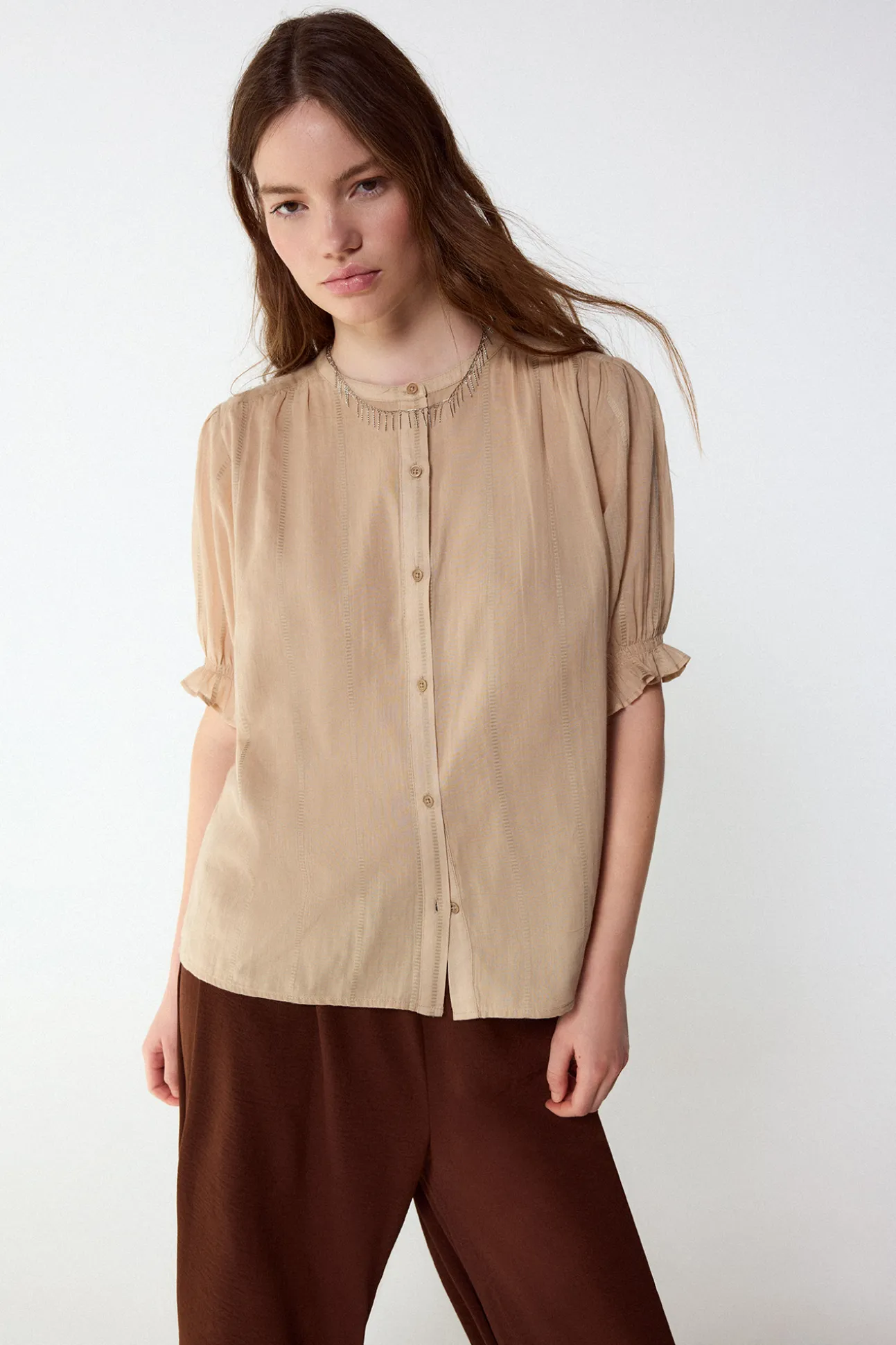 Blusa dobby fluido
