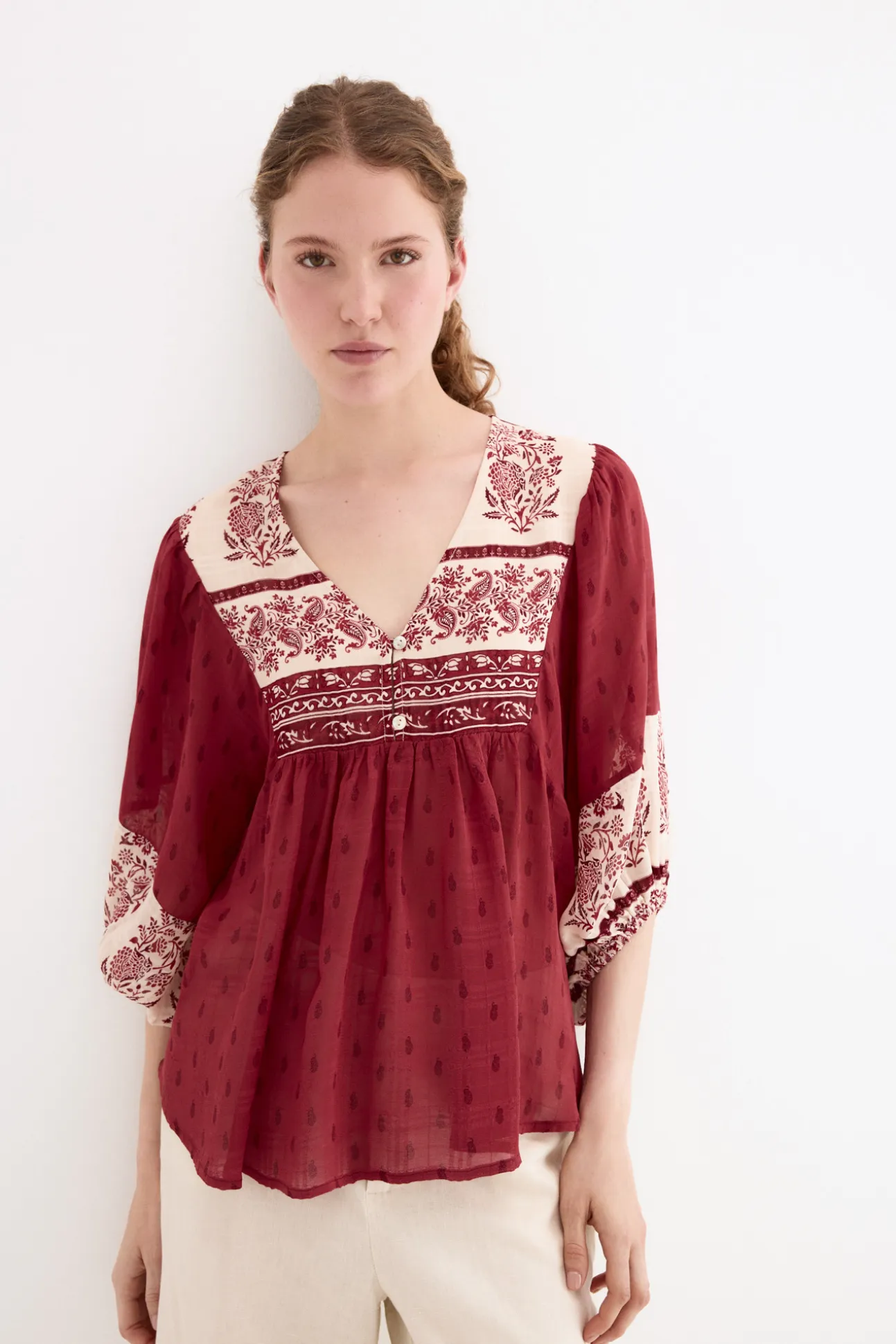 Blusa estampados combinados