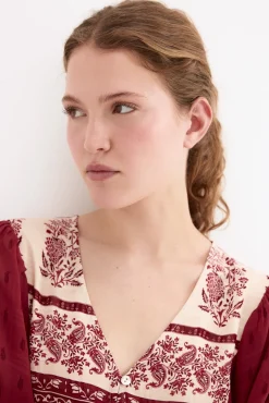 Blusa estampados combinados