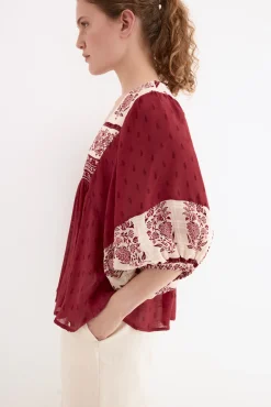 Blusa estampados combinados