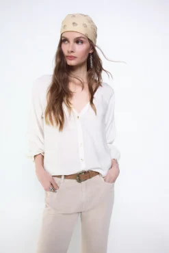 Blusa plisada fluida