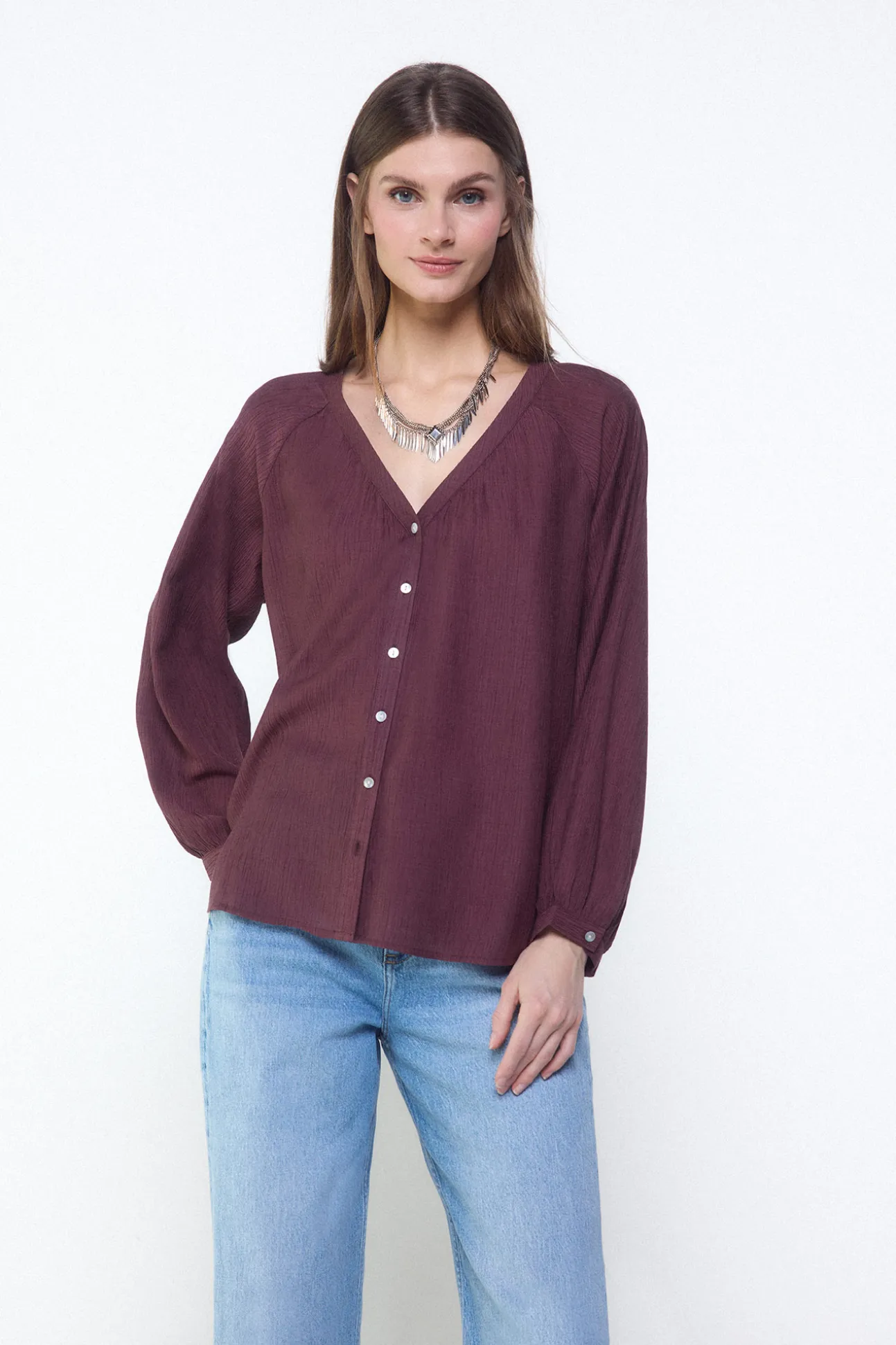 Blusa plisada fluida