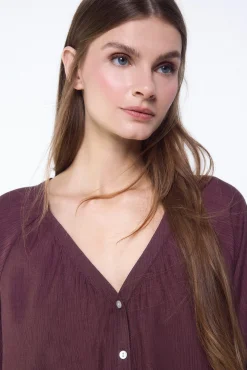 Blusa plisada fluida