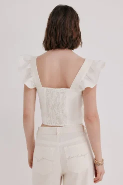 Caela. Top bordados