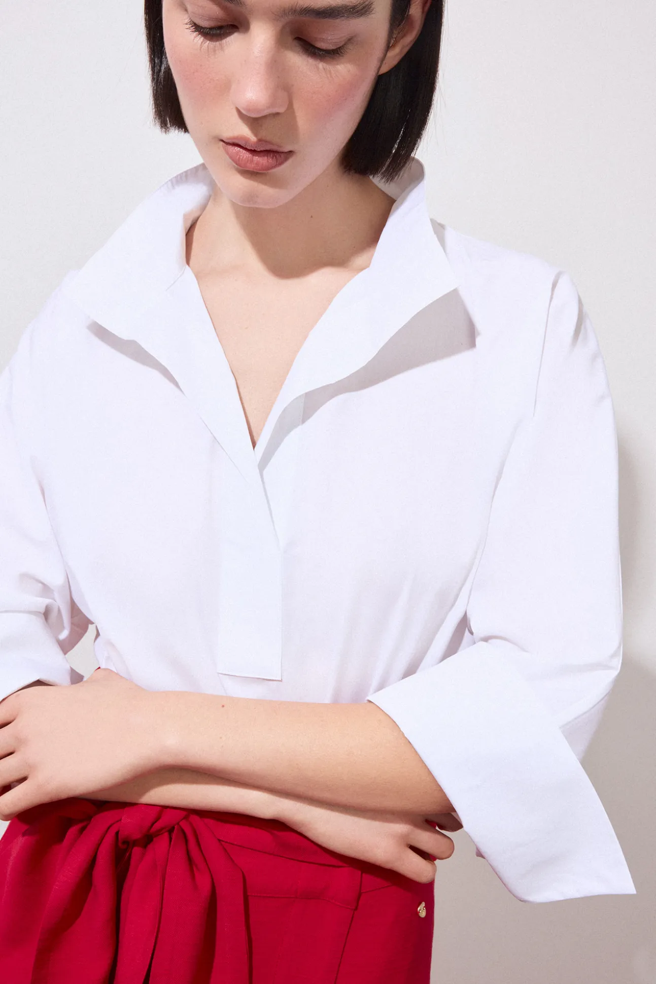 Camisa lisa amplia