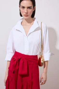 Camisa lisa amplia