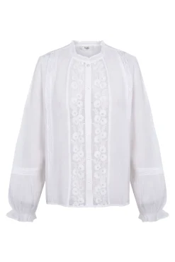 Caridad. Blusa romántica