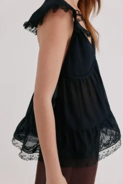 Celeste. Blusa fluida