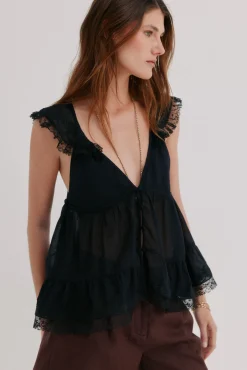 Celeste. Blusa fluida
