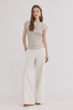 Claudia. Top con textura plisada