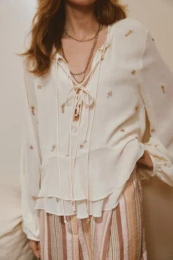 Cypria. Blusa fluída