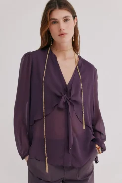 Gala. Blusa con lazada