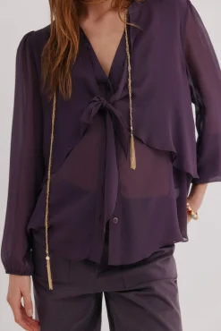 Gala. Blusa con lazada