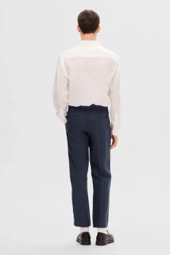 Pantalón de traje 100% lino.