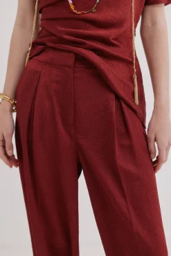 Poline. Pantalón fluído brillante