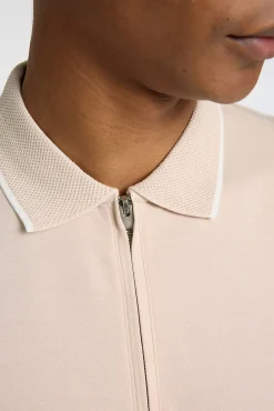 Polo de manga corta con cremallera