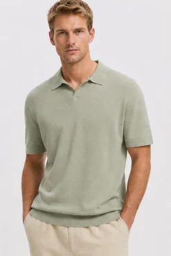 Polo de punto con cuello abierto