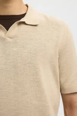Polo de punto con cuello abierto