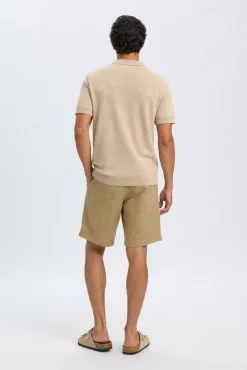 Polo de punto con cuello abierto