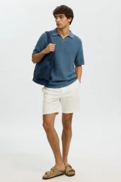 Polo de punto con cuello abierto