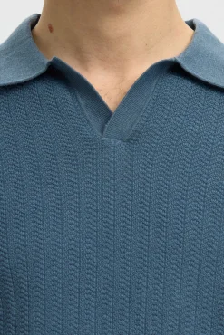 Polo de punto con cuello abierto