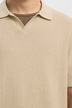 Polo de punto con cuello abierto