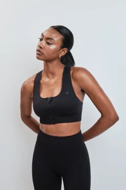 Sujetador deportivo negro cremallera SEAMLESS FIT