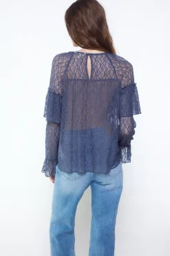 Top encaje volante